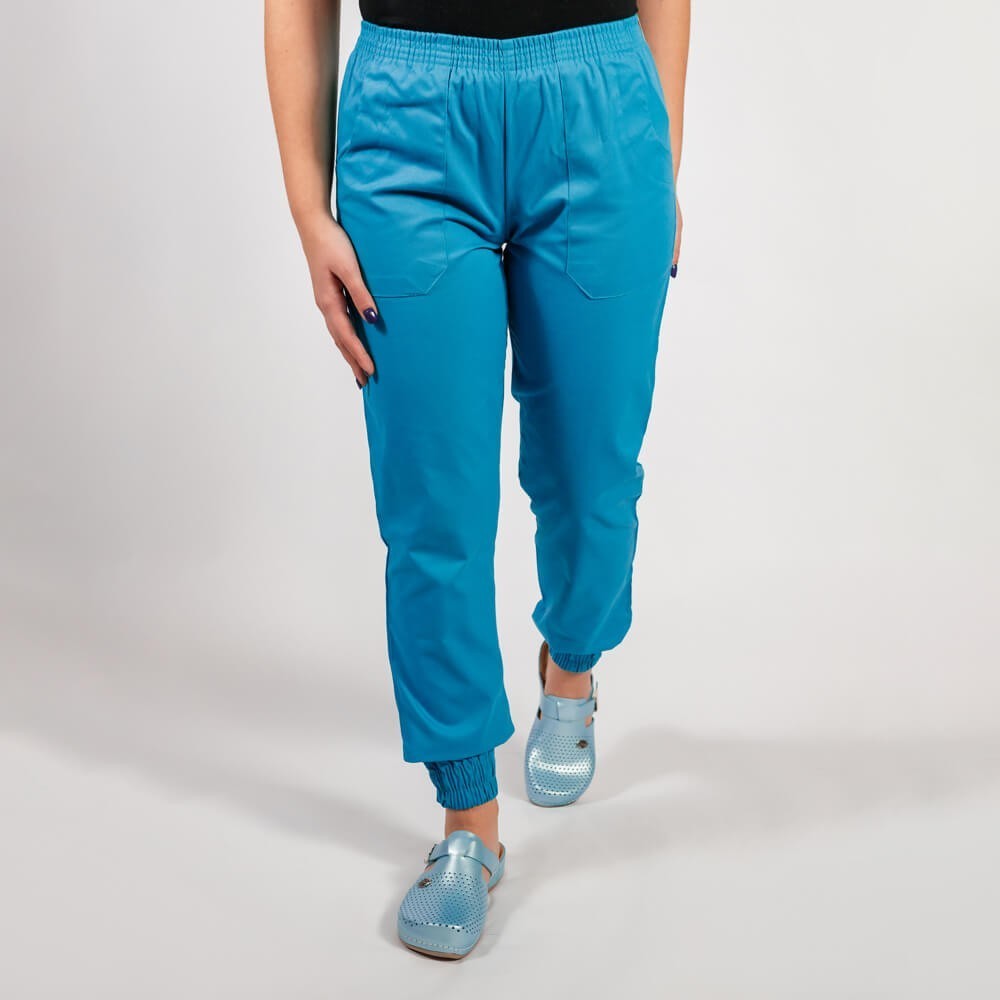 Costum Lotus 2, bluza asimetrica cu capse, pantaloni cu elastic in talie si manseta, albastru deschis