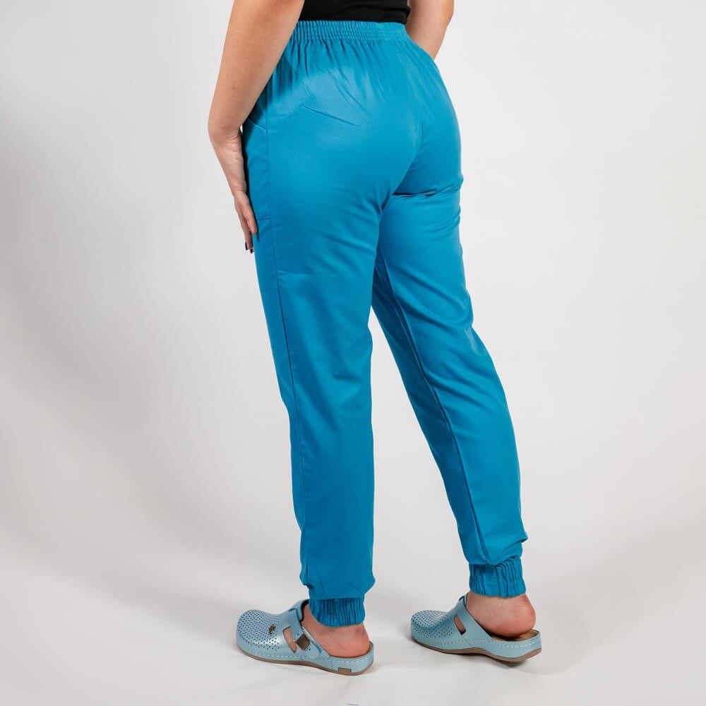 Costum Lotus 2, bluza asimetrica cu capse, pantaloni cu elastic in talie si manseta, albastru deschis