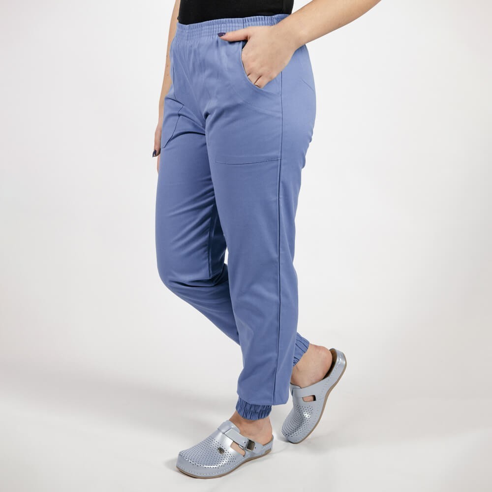 Costum Lotus 2, bluza asimetrica cu capse, pantaloni cu elastic in talie si manseta, albastru ciel