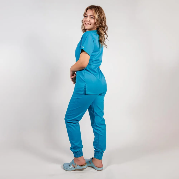 Costum Lotus 2, bluza asimetrica cu capse, pantaloni cu elastic in talie si manseta, albastru deschis - imagine 3